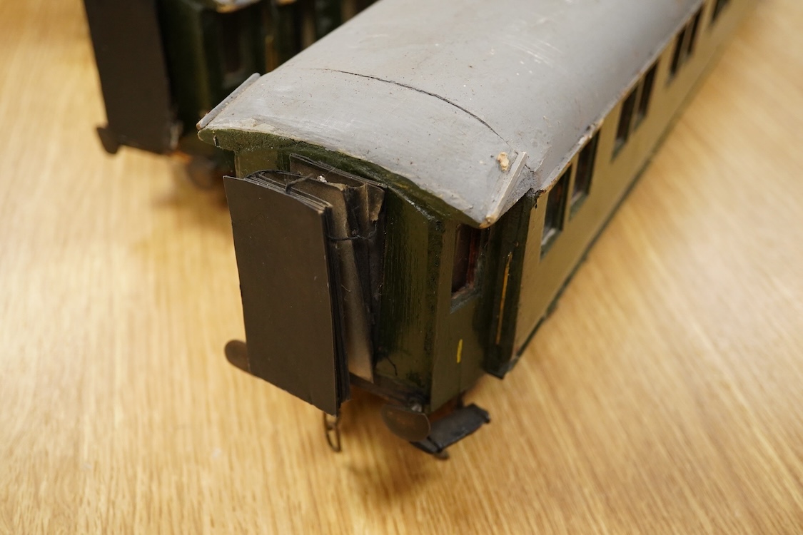 Four Gauge One Continental bogie coaches; two in very dark Green livery, and two ‘Trains Rapides Nord’ in dark green, including some scratch building and possible adaptation from kits